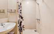 In-room Bathroom 3 Nice and Fancy Studio at Atria Residence Gading Serpong Apartment By Travelio