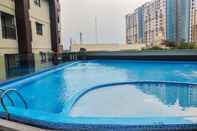 Swimming Pool Nice and Fancy Studio at Atria Residence Gading Serpong Apartment By Travelio