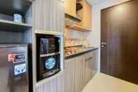 Ruang Umum Nice and Fancy Studio at Atria Residence Gading Serpong Apartment By Travelio