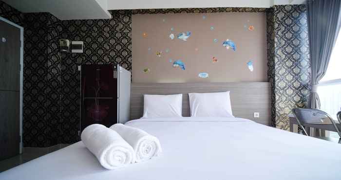 Bedroom Tidy and Clean Studio at Taman Melati Surabaya Apartment By Travelio
