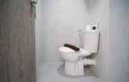 Toilet Kamar 3 Tidy and Clean Studio at Taman Melati Surabaya Apartment By Travelio
