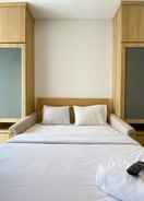 BEDROOM Homey and Modern Design Studio Ciputra World 2 Apartment By Travelio