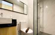 In-room Bathroom 3 Homey and Modern Design Studio Ciputra World 2 Apartment By Travelio