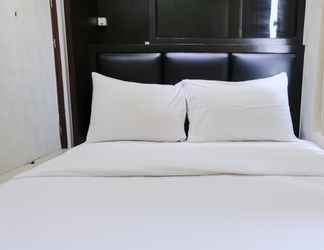 Kamar Tidur 2 Cozy and Homey 2BR Apartment at Tamansari Panoramic By Travelio