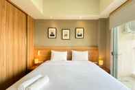 Bedroom Elegant and Spacious Studio Apartment Mustika Golf Residence By Travelio
