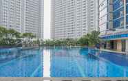 Swimming Pool 5 Spacious Studio Apartment at La Riz Supermall Mansion By Travelio