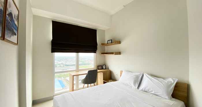 Bedroom Comfort and Nice 1BR Vasanta Innopark Apartment By Travelio