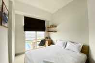 Bedroom Comfort and Nice 1BR Vasanta Innopark Apartment By Travelio