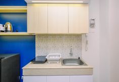 Ruang untuk Umum 2 Minimalist and Comfy Studio with City View at Evenciio Margonda Apartment By Travelio
