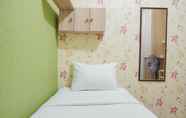 Toilet Kamar 2 Simply and Comfort 2BR Green Pramuka City Apartment By Travelio