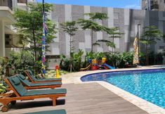 Swimming Pool 5 Minimalist Studio Signature Park Grande Apartment By Travelio