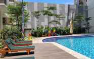 Swimming Pool 5 Minimalist Studio Signature Park Grande Apartment By Travelio
