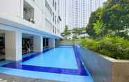 Kolam Renang 6 Homey and Best Deal 2BR Bassura City Apartment By Travelio