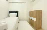 Bedroom 2 Homey and Best Deal 2BR Bassura City Apartment By Travelio