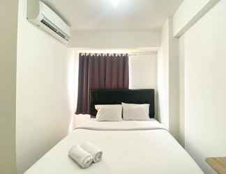 Bedroom 2 Homey and Best Deal 2BR Bassura City Apartment By Travelio
