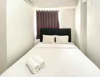 Bilik Tidur 2 Homey and Full Furnished 2BR Bassura City Apartment near Mall By Travelio