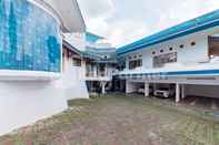 Exterior Biru Homestay Bandung Mitra RedDoorz