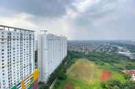 Lobi Strategic and Comfort Living 2BR at Bassura City Apartment By Travelio