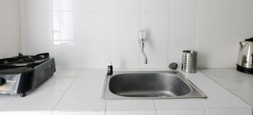 공용 공간 3 Homey 1BR with Extra Room at Parahyangan Residence Apartment By Travelio