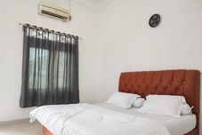 침실 Adela Homestay Syariah Near Universitas Muhammadiyah Jambi Mitra RedDoorz