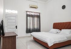 침실 7 Adela Homestay Syariah Near Universitas Muhammadiyah Jambi Mitra RedDoorz