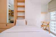 Bedroom Simply Look and Homey Studio Tokyo Riverside PIK 2 Apartment By Travelio