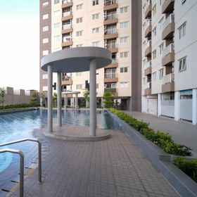 Swimming Pool 7 Homey and Best Choice 2BR at Puncak Dharmahusada Apartment By Travelio, Mulyorejo Hotels
