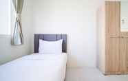 Bedroom 2 Homey and Best Choice 2BR at Puncak Dharmahusada Apartment By Travelio