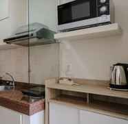 Common Space 2 Cozy and Homey Studio Apartment at Dago Suites By Travelio