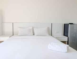 Kamar Tidur 2 Cozy and Homey Studio Apartment at Dago Suites By Travelio