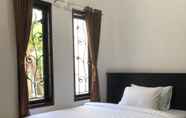 Bedroom 2 white dove guest house 3 canggu