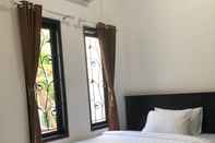 ห้องนอน white dove guest house 3 canggu