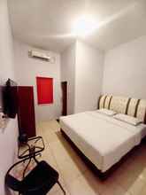 Kamar Tidur 4 Delto Guest House