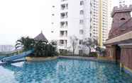Swimming Pool 4 Homey and Cozy Studio Great Western Resort Apartment By Travelio