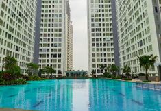Swimming Pool 4 Elegant and Homey Studio Apartment M-Town Residence By Travelio