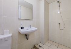 In-room Bathroom 3 Elegant and Homey Studio Apartment M-Town Residence By Travelio