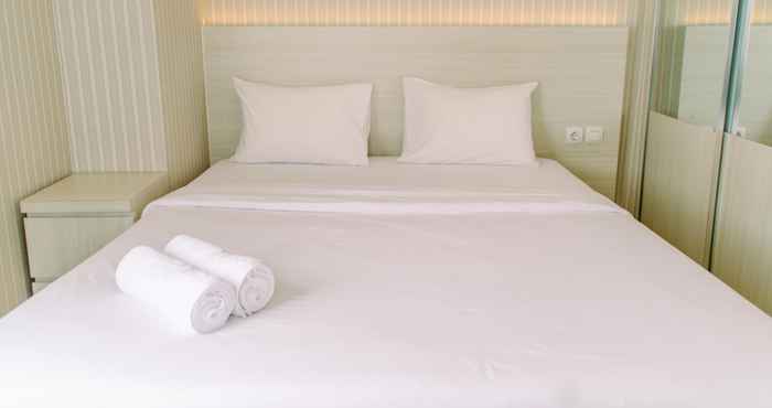 Kamar Tidur Serene and Comfort 2BR at Urban Heights Apartment By Travelio