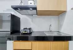 Common Space 2 Cozy and Restful Studio at Serpong Garden Apartment By Travelio