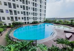 Kolam Renang 5 Cozy and Lovely Studio at Serpong Garden Apartment By Travelio