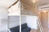 Kamar Tidur Homey and Simply Look Studio Apartment Tokyo Riverside PIK 2 By Travelio