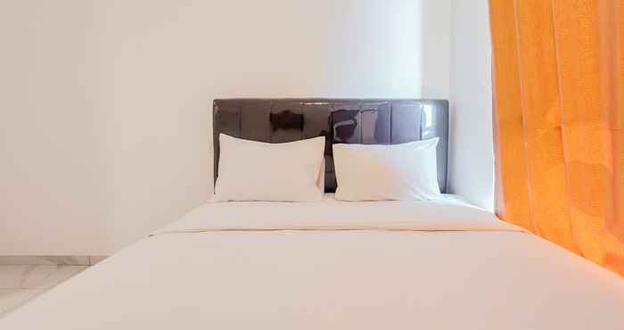 Kamar Tidur Comfort and Cozy Studio Sky House Alam Sutera Apartment By Travelio