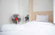 Bedroom 2 Homey and Comfy 2BR Transpark Cibubur Apartment By Travelio