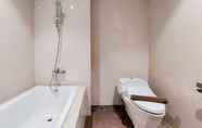 In-room Bathroom 6 3BR Modern Look with Branz BSD City Apartment By Travelio