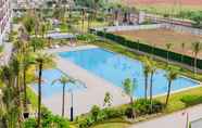 Swimming Pool 7 Well Designed 2BR Apartment Sky House BSD By Travelio