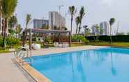 Swimming Pool 6 Well Designed 2BR Apartment Sky House BSD By Travelio