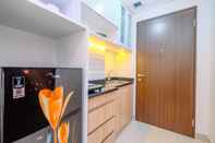 Common Space Homey and Cozy Living Studio Transpark Cibubur Apartment By Travelio