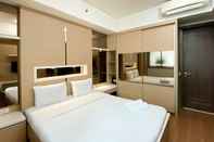 ห้องนอน Comfort and Modern Look 2BR Kemang Village Apartment By Travelio