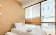 Bedroom 2 Comfort and Modern Look 2BR Kemang Village Apartment By Travelio