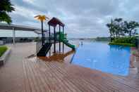 Swimming Pool Comfortable 1BR Apartment without Living Room at Amartha View By Travelio