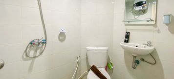 In-room Bathroom 3 Comfortable 1BR Apartment without Living Room at Amartha View By Travelio